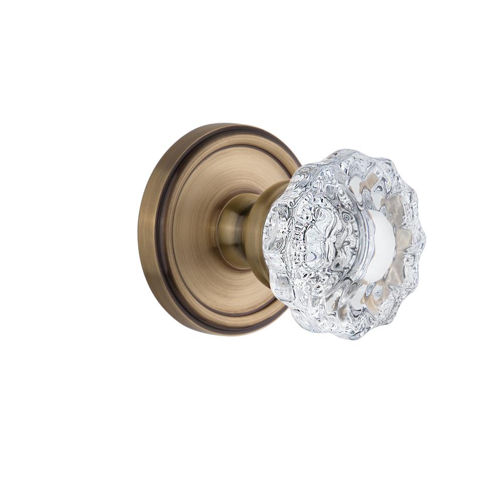 Grandeur by Nostalgic Warehouse GEOVER Privacy Knob - Georgetown Rosette with Versailles Crystal Knob in Vintage Brass
